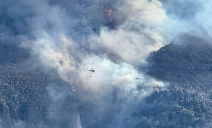 Heroes on the Frontline: Firefighters Battle Blaze on Table Mountain